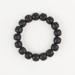 Ebony Wood Mantra Bracelet – Overhead view of full circular bead arrangement on pure white, prayer beads