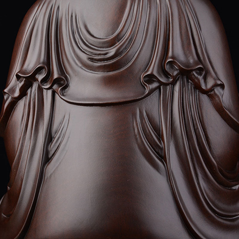 Ebony Avalokitesvara Lotus Decoration – Macro detail of flowing robe folds and deep undercuts, ebony wood craftsmanship