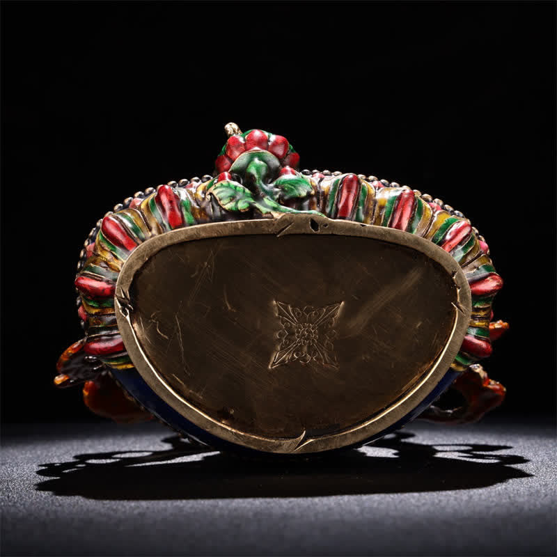 Yellow Jambhala Copper Statue – displayed with coins and citrine, wealth corner feng shui arrangement