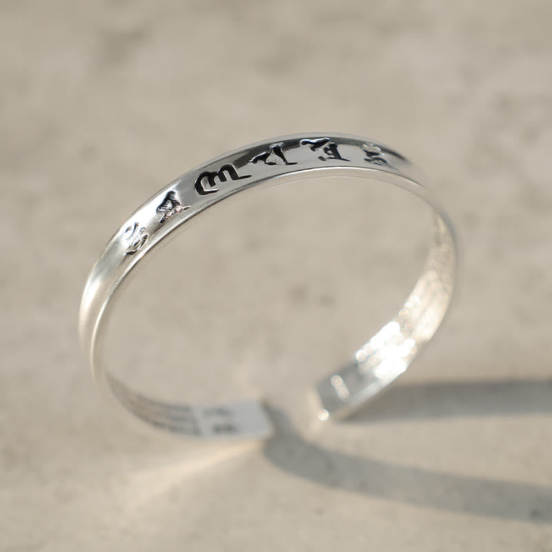 Tibetan Mantra Copper Bracelet - Three-quarter view revealing curved interior and exterior engraving