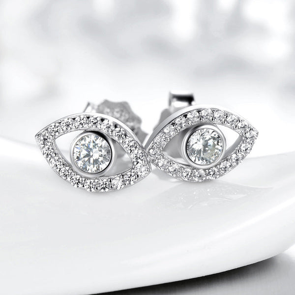 925 Silver Evil Eye Stud Earrings on Glossy White Ceramic Dish, Pavé Crystal Halo Design