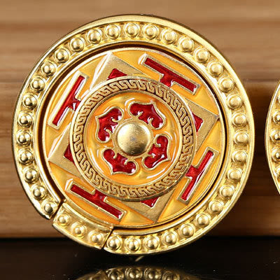 Om Mani Padme Hum Phone Ring Holder – Gold cufflink with red enamel geometric pattern, formal accessory