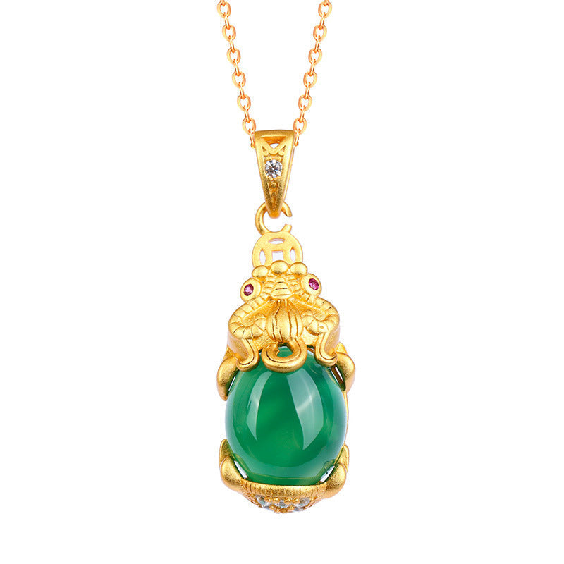 Natural Jade Pixiu Necklace – green jade Pixiu pendant on gold chain white background, prosperity