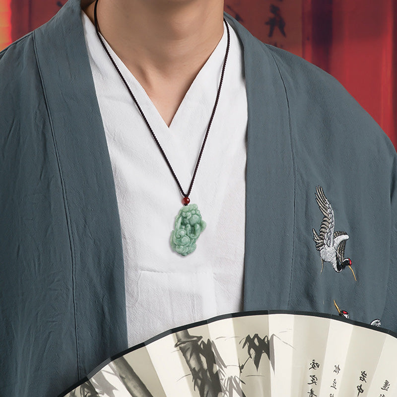 Jade PiXiu Necklace – Man in grey jacket holding fan wearing jade Pixiu, traditional Chinese style