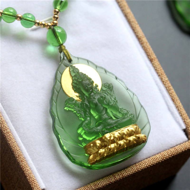 Green Tara Liuli Crystal Necklace – pendant resting in white gift box, closeup packaging, gift box