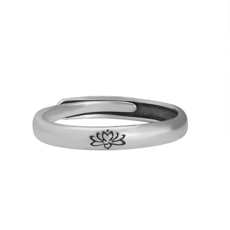 Lotus Enlightenment Ring - adjustable open band with lotus on white background, minimalist