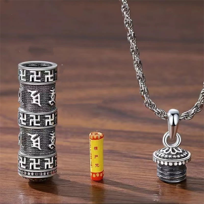 Copper Om Mani Padme Hum Necklace – Disassembled prayer wheel pendant showing interior Surangama Mantra scroll and screw-top lid construction, Tibetan amulet necklace