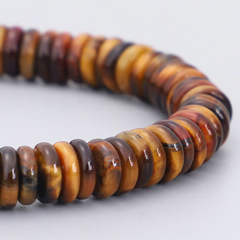 Tiger Eye Om Mani Padme Hum Bracelet - macro detail of polished tiger eye bead strand