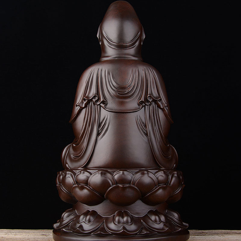 Ebony Avalokitesvara Lotus Decoration – Rear view of carved drapery folds and cloud cuffs, ebony statue
