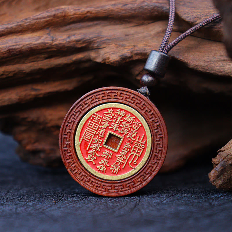 Lightning Struck Jujube Wood Pendant – Round wooden coin pendant with gold metal inlay, red enamel center featuring Taoist pr