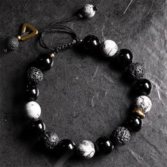 Black Obsidian Lava Rock Bracelet – Top-down flat lay showing onyx, howlite, lava beads, natural stone bracelet