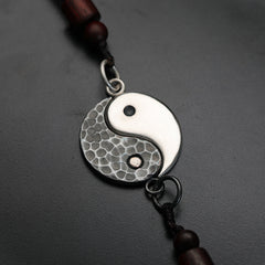 Sterling Silver Yin Yang Pendant - Dual-tone metal pendant with smooth and hammered texture on braided cord, silver yin yang 