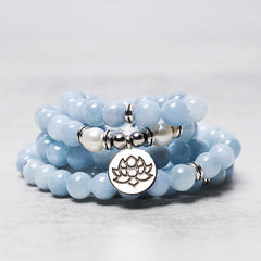 Aquamarine Healing Bracelet – stacked bead strands with pearl accents, calming
