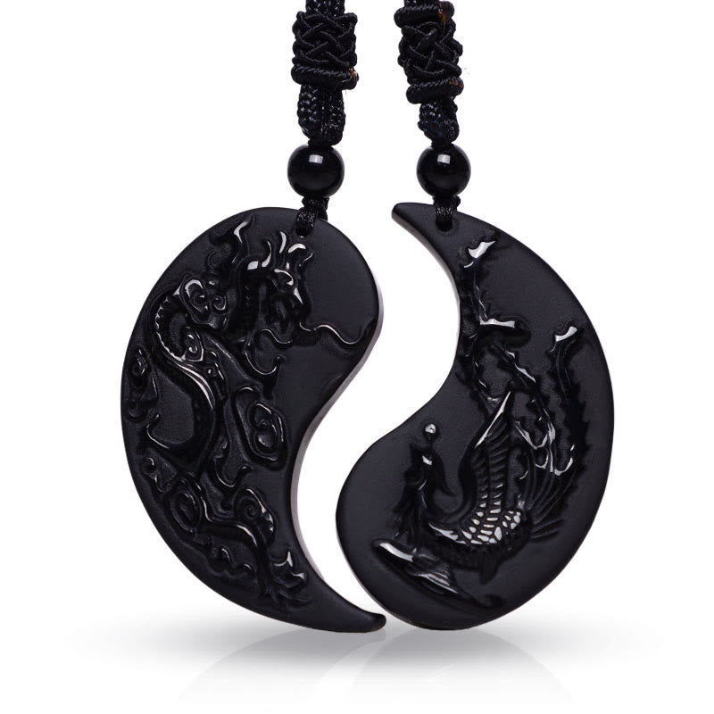 Black Obsidian Dragon Phoenix Necklace - Obsidian dragon phoenix yin yang pendants on white background, Protection