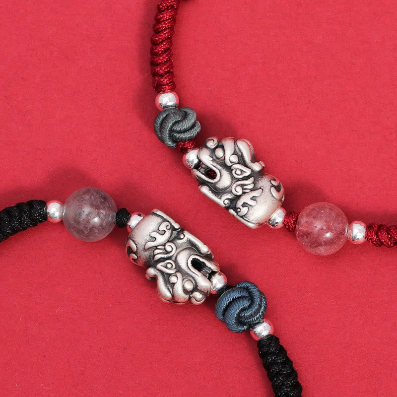 Silver PiXiu Strawberry Quartz Bracelet – Two silver PiXiu charms crossed on cords