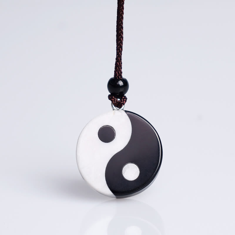 Black Obsidian White Turquoise Yin Yang Strength Fulfilment Necklace Pendant - Yin-yang pendant with silver bail on white, ha