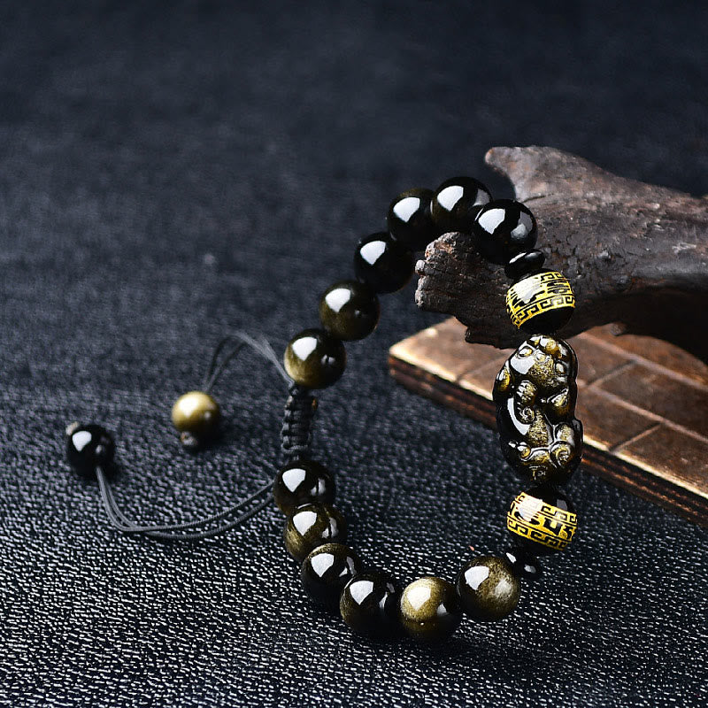 Gold Sheen Obsidian Pixiu Bracelet – Styled with driftwood and antique book, golden luster, Zen decor