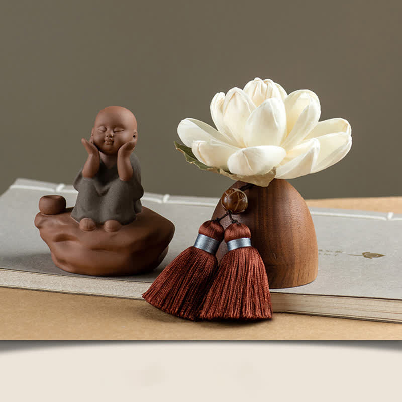 Black Peach Wood Buddha Flower Decoration – water droplet on polished surface, smooth protective finish