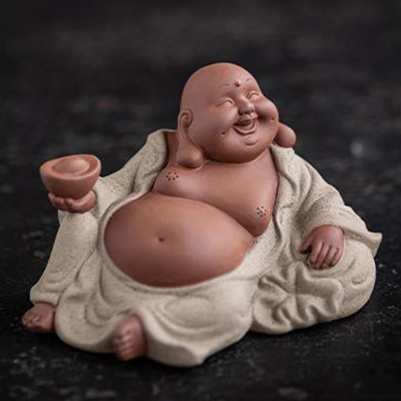 Laughing Buddha Clay Statue – statue beside lucky cat and coins, prosperity corner arrangement