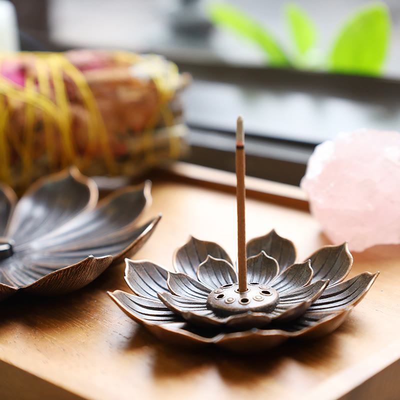 Six-Hole Lotus Incense Burner close-up, cast bronze petal details, peaceful