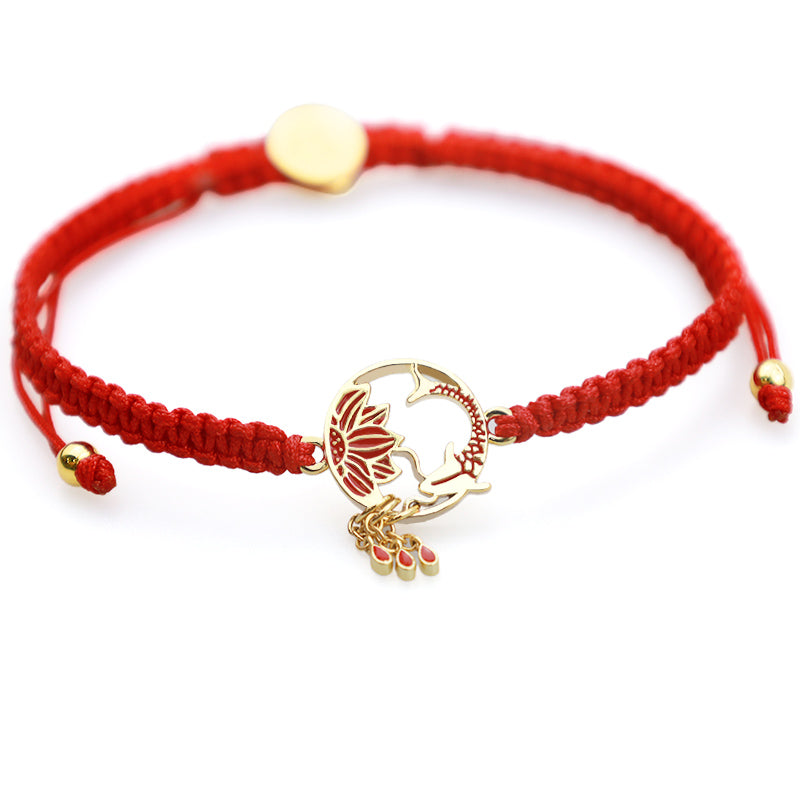 Tibetan Red String Koi Fish Bracelet – close-up of gold lotus koi charm with teardrop pendants on white, detail view