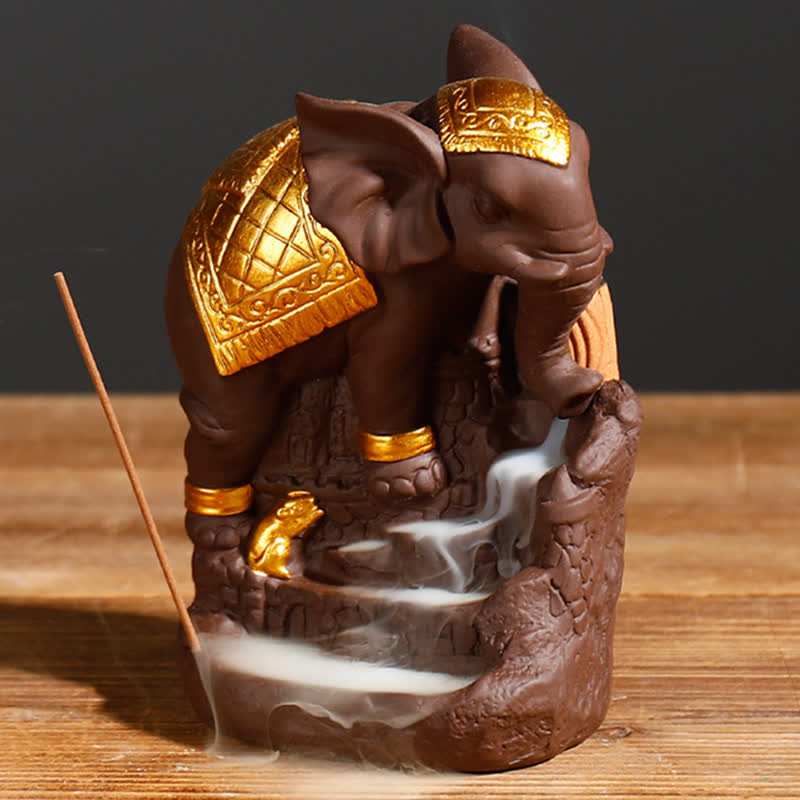 Gold-Trimmed Elephant Incense Holder – Right side angle with cascading smoke and incense stick on wooden surface