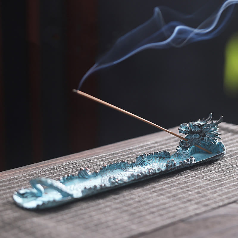 Dragon Alloy Incense Burner - Verdigris dragon with rising smoke on wood, mindful