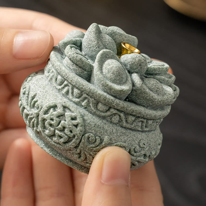 Fu Character Sandstone Incense Burner – cradled in palms revealing fa prosperity text, sandstone burner