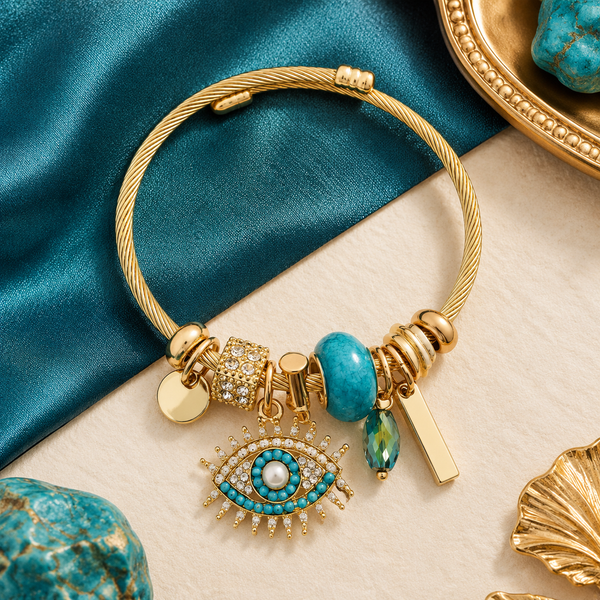 Gold Plated Stainless Steel Evil Eye Open Cuff Bracelet - flat lay