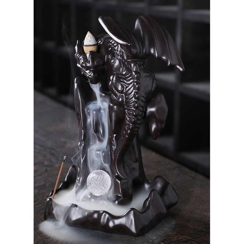 Nordic Dragon Backflow Incense Burner with silver medallion, smoke waterfall over dark ceramic dragon, backflow incense