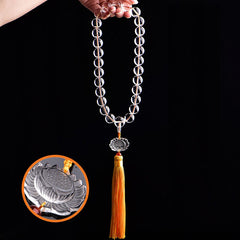 White Crystal Lotus Mala – clear beads with carved lotus pendant and yellow silk tassel, crystal healing