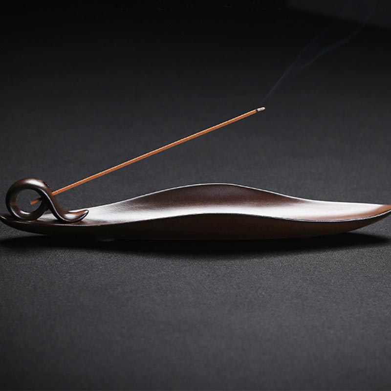 Ceramic Incense Burner – Bronze-brown scroll holder with delicate smoke trail, Meditation