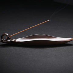 Ceramic Incense Burner – Bronze-brown scroll holder with delicate smoke trail, Meditation
