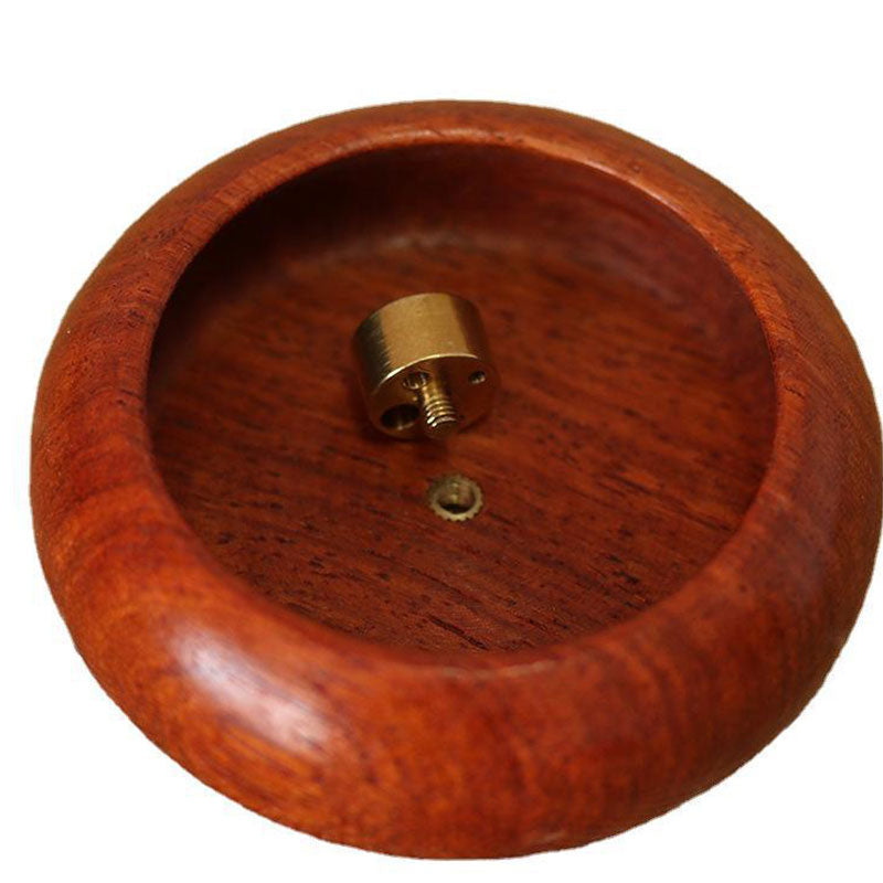 Rosewood Incense Burner – overhead view of threaded brass fitting inside polished wooden bowl, refined