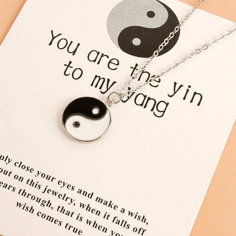 Yin Yang Pendant Necklace - Angled drape on sentiment card, harmony balance jewelry