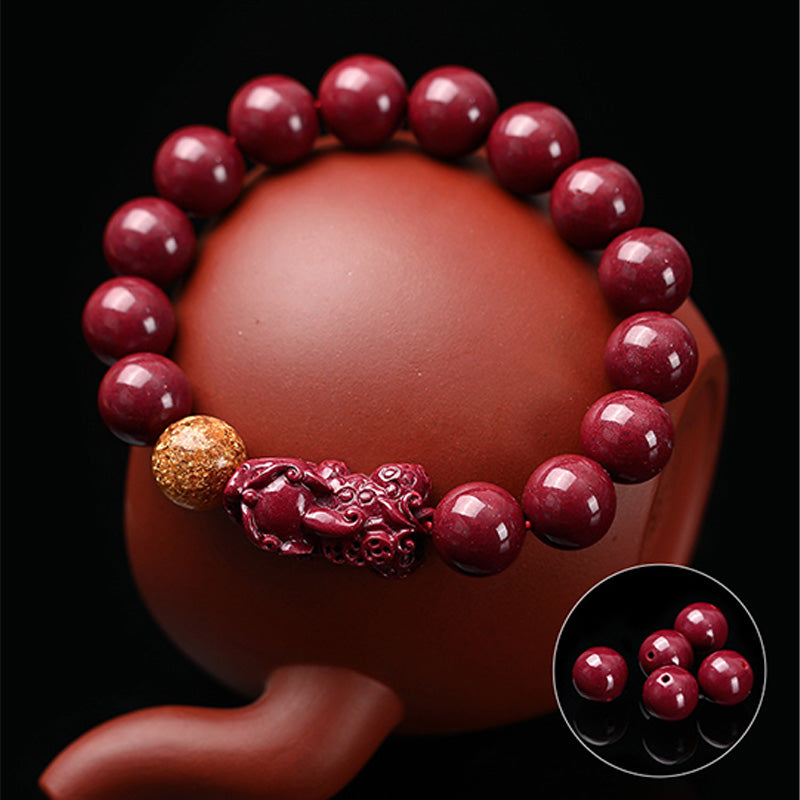 Tibetan Cinnabar PiXiu Bracelet – Bracelet on ceramic vase with bead detail inset, wealth talisman