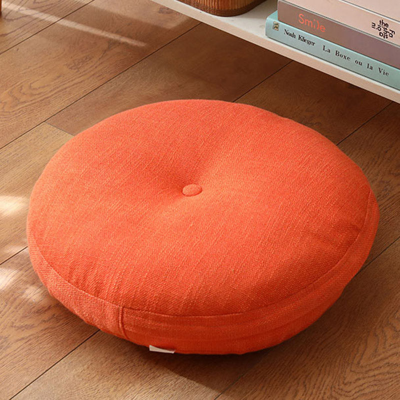 Lotus Linen Meditation Cushion – Bright coral orange with fabric tag, bold accent
