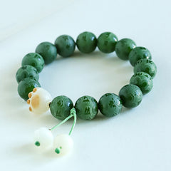 Bodhi Seed Om Mani Padme Hum Carved Bracelet - Half black half white bead bracelet with yin-yang metal spacer, antique boo...