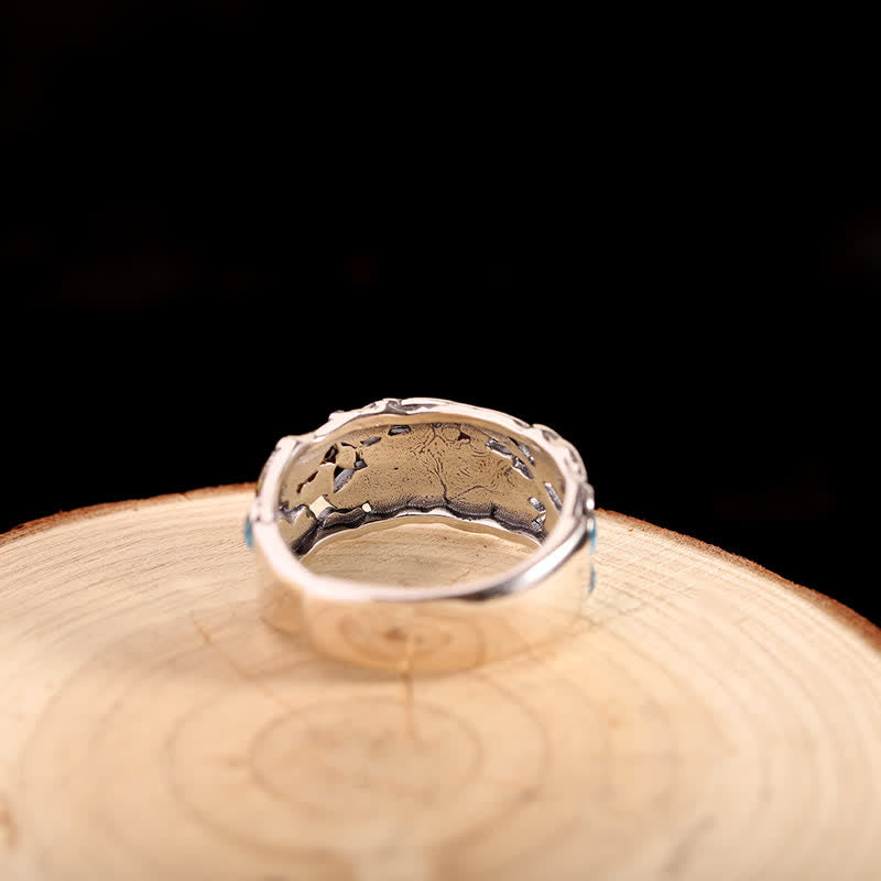 Sterling Silver Lotus Koi Ring - Hammered interior with turquoise accents on wood display, silver ring