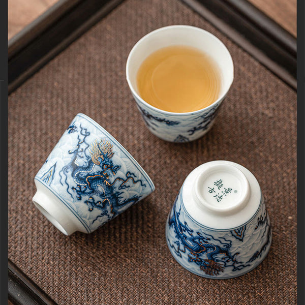 Blue & White Dragon Ceramic Teacup – three cups on woven mat, one inverted showing base mark, authentic