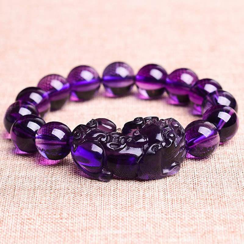 Amethyst PiXiu Fortune Bracelet – Deep purple amethyst beads with carved PiXiu on fabric, wealth protection