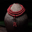 108 Mala Beads Cinnabar Bracelet – Draped on ceramic vase, red prayer beads necklace