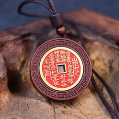 Lightning Struck Jujube Wood Pendant – Coin-shaped wooden amulet with red enamel center, gold Taoist thunder incantation char