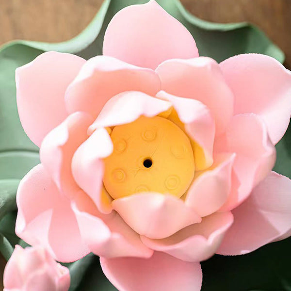 Lotus Ceramic Incense Burner - top-down view into pink lotus center with yellow seed pod and incense hole