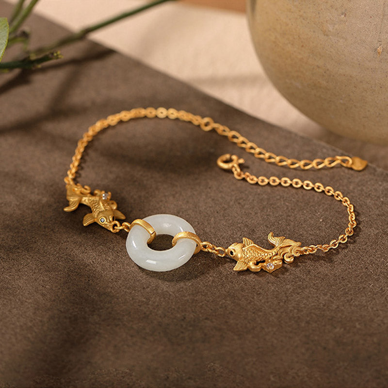 White Jade Koi Bracelet – macro detail of bead hole drilling and stringing craftsmanship