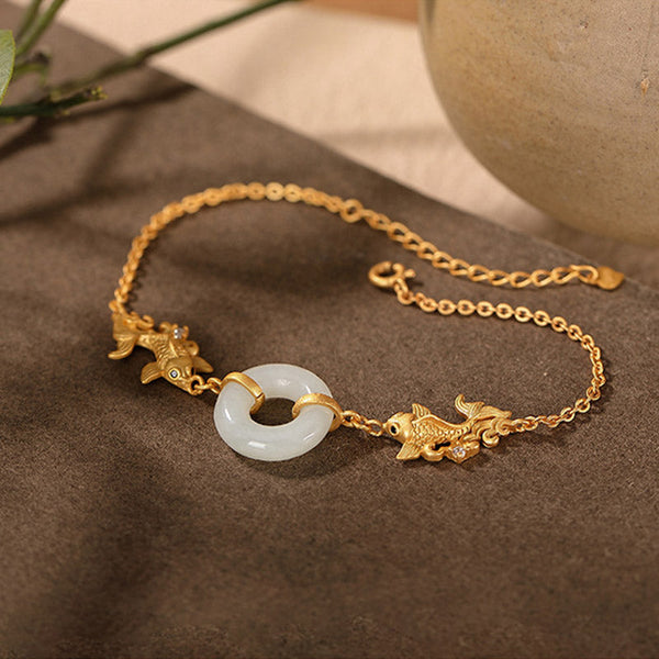 White Jade Koi Bracelet – macro detail of bead hole drilling and stringing craftsmanship