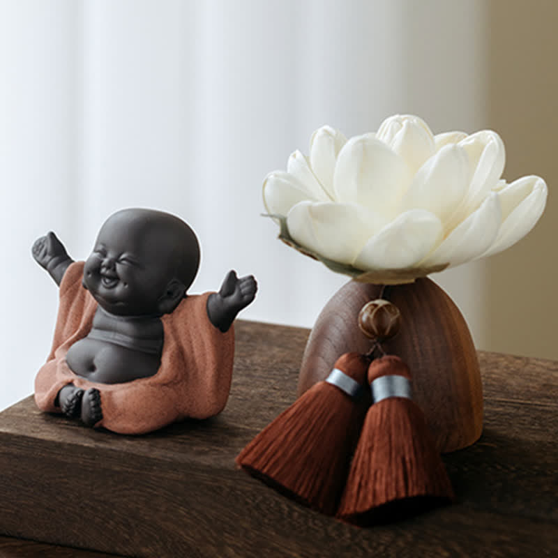 Black Peach Wood Buddha Flower Decoration – on office desk with candle, calm cure stress relief setup