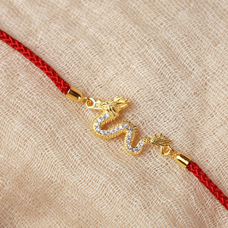 925 Silver Dragon Bracelet - Diagonal red cord with crystal dragon on knit fabric, artisan craft
