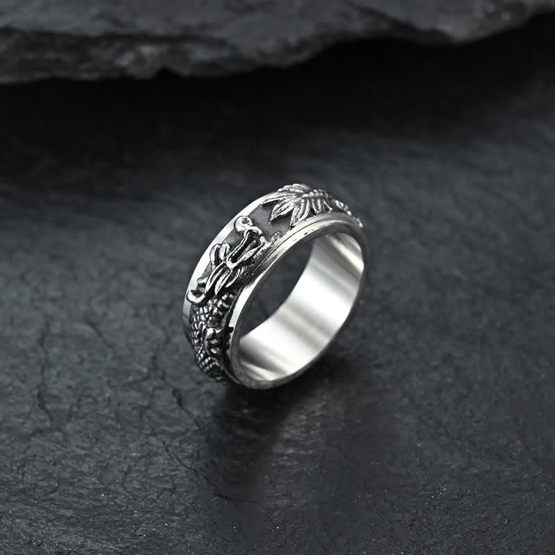Dragon Titanium Steel Ring – Silver-gold spinner with specs on white, precision