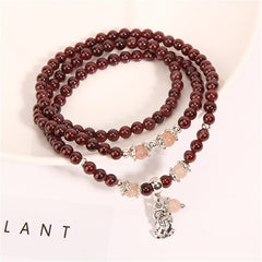 Garnet Strawberry Quartz Green Beans PiXiu Wrap Bracelet – garnet wrap with silver PiXiu charm on white, protection